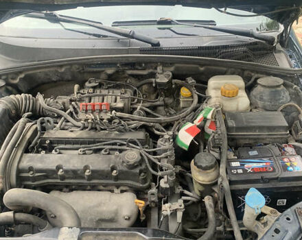 Зеленый Шевроле Лачетти, объемом двигателя 1.6 л и пробегом 258 тыс. км за 4000 $, фото 4 на Automoto.ua