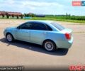 Зеленый Шевроле Лачетти, объемом двигателя 1.8 л и пробегом 400 тыс. км за 3750 $, фото 1 на Automoto.ua