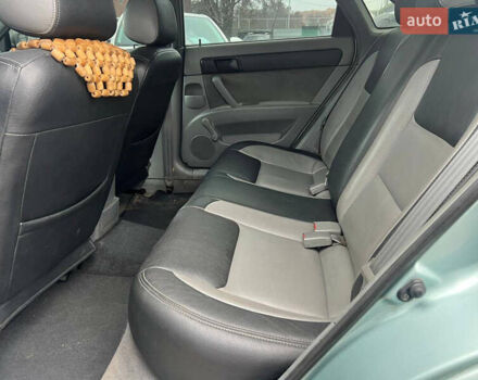 Зеленый Шевроле Лачетти, объемом двигателя 1.6 л и пробегом 237 тыс. км за 4999 $, фото 12 на Automoto.ua