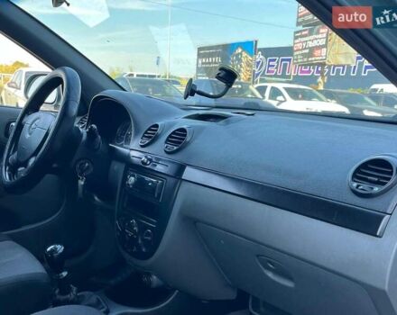 Зелений Шевроле Лачетті, об'ємом двигуна 1.8 л та пробігом 238 тис. км за 4490 $, фото 32 на Automoto.ua