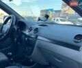 Зелений Шевроле Лачетті, об'ємом двигуна 1.8 л та пробігом 238 тис. км за 4490 $, фото 32 на Automoto.ua