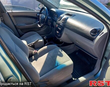 Зеленый Шевроле Лачетти, объемом двигателя 1.8 л и пробегом 213 тыс. км за 3950 $, фото 7 на Automoto.ua