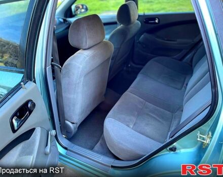 Зеленый Шевроле Лачетти, объемом двигателя 1.8 л и пробегом 205 тыс. км за 3500 $, фото 8 на Automoto.ua