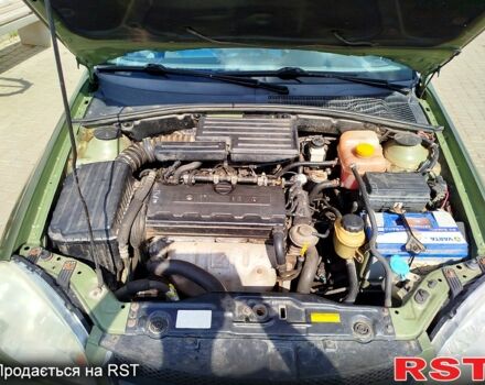 Зеленый Шевроле Лачетти, объемом двигателя 1.8 л и пробегом 187 тыс. км за 4500 $, фото 11 на Automoto.ua