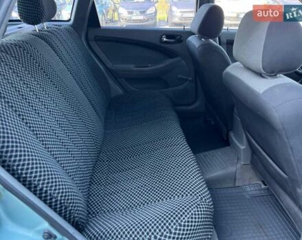 Зелений Шевроле Лачетті, об'ємом двигуна 1.8 л та пробігом 238 тис. км за 4490 $, фото 30 на Automoto.ua