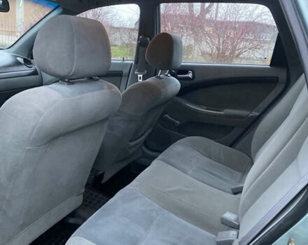 Зелений Шевроле Лачетті, об'ємом двигуна 1.8 л та пробігом 274 тис. км за 2800 $, фото 4 на Automoto.ua