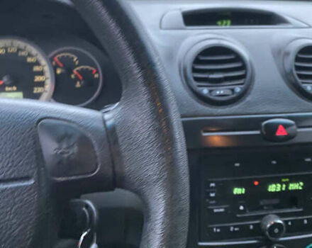 Зелений Шевроле Лачетті, об'ємом двигуна 1.8 л та пробігом 274 тис. км за 2800 $, фото 8 на Automoto.ua