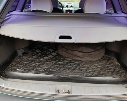 Зеленый Шевроле Лачетти, объемом двигателя 1.8 л и пробегом 207 тыс. км за 4155 $, фото 11 на Automoto.ua