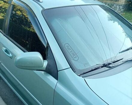 Зеленый Шевроле Лачетти, объемом двигателя 1.6 л и пробегом 215 тыс. км за 4500 $, фото 11 на Automoto.ua