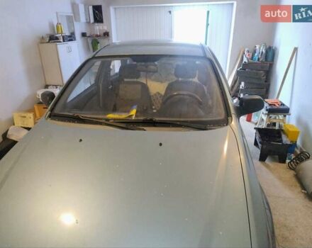 Зеленый Шевроле Лачетти, объемом двигателя 1.6 л и пробегом 249 тыс. км за 2000 $, фото 1 на Automoto.ua