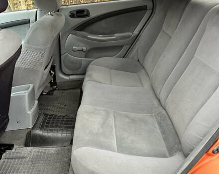 Оранжевый Шевроле Лачетти, объемом двигателя 1.6 л и пробегом 190 тыс. км за 3650 $, фото 10 на Automoto.ua