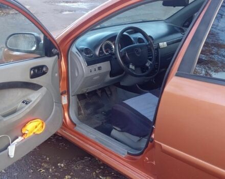 Оранжевый Шевроле Лачетти, объемом двигателя 1.6 л и пробегом 270 тыс. км за 3200 $, фото 4 на Automoto.ua