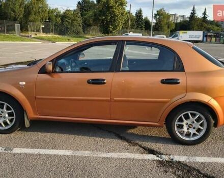 Оранжевый Шевроле Лачетти, объемом двигателя 2 л и пробегом 272 тыс. км за 3400 $, фото 14 на Automoto.ua