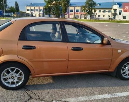 Оранжевый Шевроле Лачетти, объемом двигателя 2 л и пробегом 272 тыс. км за 3400 $, фото 10 на Automoto.ua