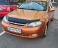 Оранжевый Шевроле Лачетти, объемом двигателя 2 л и пробегом 272 тыс. км за 3400 $, фото 1 на Automoto.ua