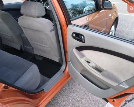 Оранжевый Шевроле Лачетти, объемом двигателя 2 л и пробегом 272 тыс. км за 3400 $, фото 5 на Automoto.ua