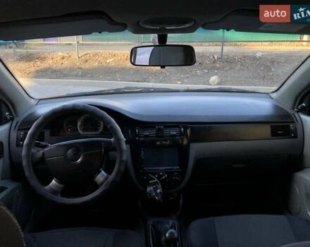 Оранжевый Шевроле Лачетти, объемом двигателя 1.6 л и пробегом 285 тыс. км за 3499 $, фото 17 на Automoto.ua