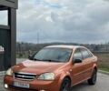 Оранжевый Шевроле Лачетти, объемом двигателя 1.6 л и пробегом 200 тыс. км за 2999 $, фото 1 на Automoto.ua