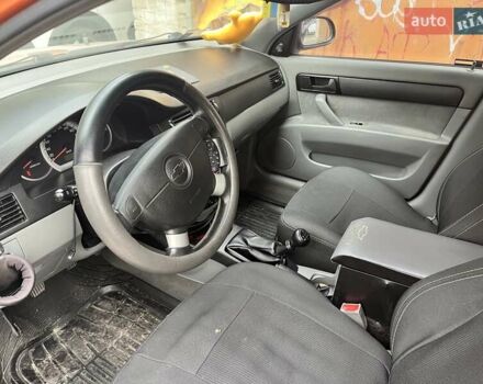 Оранжевый Шевроле Лачетти, объемом двигателя 1.6 л и пробегом 176 тыс. км за 4300 $, фото 6 на Automoto.ua