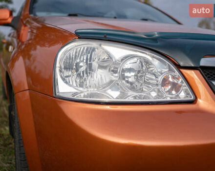Оранжевый Шевроле Лачетти, объемом двигателя 1.8 л и пробегом 273 тыс. км за 3900 $, фото 2 на Automoto.ua