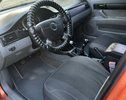 Помаранчевий Шевроле Лачетті, об'ємом двигуна 1.6 л та пробігом 375 тис. км за 4200 $, фото 6 на Automoto.ua