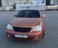 Оранжевый Шевроле Лачетти, объемом двигателя 1.8 л и пробегом 240 тыс. км за 2800 $, фото 1 на Automoto.ua