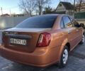 Оранжевый Шевроле Лачетти, объемом двигателя 1.6 л и пробегом 285 тыс. км за 3499 $, фото 3 на Automoto.ua
