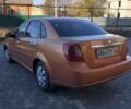 Помаранчевий Шевроле Лачетті, об'ємом двигуна 1.6 л та пробігом 285 тис. км за 3500 $, фото 1 на Automoto.ua