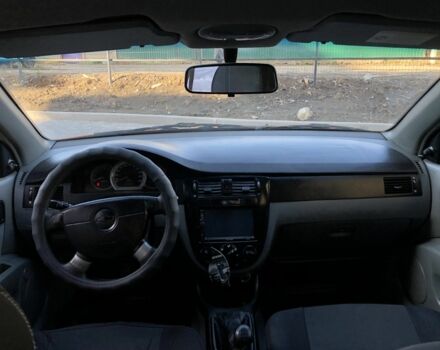 Помаранчевий Шевроле Лачетті, об'ємом двигуна 1.6 л та пробігом 285 тис. км за 3500 $, фото 4 на Automoto.ua