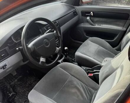 Оранжевый Шевроле Лачетти, объемом двигателя 1.8 л и пробегом 240 тыс. км за 2999 $, фото 5 на Automoto.ua