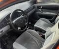 Оранжевый Шевроле Лачетти, объемом двигателя 1.8 л и пробегом 240 тыс. км за 2999 $, фото 5 на Automoto.ua