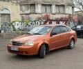 Оранжевый Шевроле Лачетти, объемом двигателя 1.6 л и пробегом 200 тыс. км за 2900 $, фото 1 на Automoto.ua