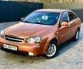 Оранжевый Шевроле Лачетти, объемом двигателя 1.6 л и пробегом 250 тыс. км за 2600 $, фото 1 на Automoto.ua