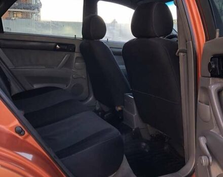 Оранжевый Шевроле Лачетти, объемом двигателя 1.6 л и пробегом 285 тыс. км за 3499 $, фото 18 на Automoto.ua