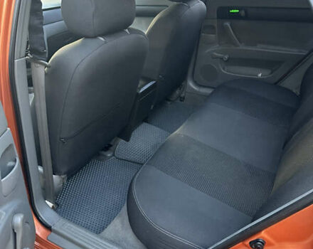 Помаранчевий Шевроле Лачетті, об'ємом двигуна 1.6 л та пробігом 375 тис. км за 4200 $, фото 7 на Automoto.ua