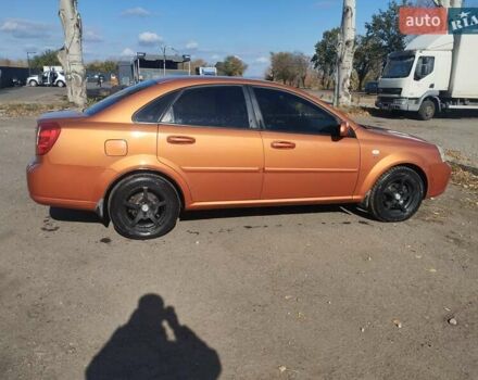 Помаранчевий Шевроле Лачетті, об'ємом двигуна 1.8 л та пробігом 207 тис. км за 4400 $, фото 9 на Automoto.ua