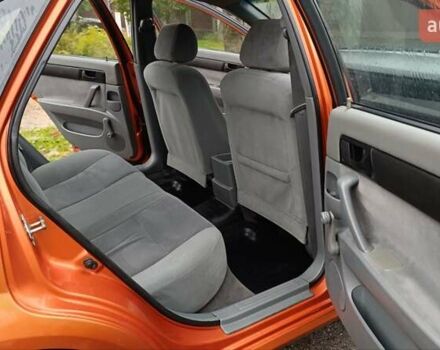 Оранжевый Шевроле Лачетти, объемом двигателя 1.6 л и пробегом 267 тыс. км за 3600 $, фото 3 на Automoto.ua