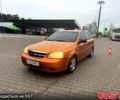 Оранжевый Шевроле Лачетти, объемом двигателя 1.6 л и пробегом 220 тыс. км за 2700 $, фото 1 на Automoto.ua