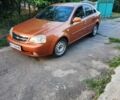 Помаранчевий Шевроле Лачетті, об'ємом двигуна 1.8 л та пробігом 123 тис. км за 4500 $, фото 1 на Automoto.ua