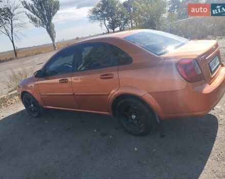 Помаранчевий Шевроле Лачетті, об'ємом двигуна 1.8 л та пробігом 207 тис. км за 4400 $, фото 7 на Automoto.ua