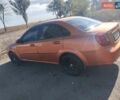 Помаранчевий Шевроле Лачетті, об'ємом двигуна 1.8 л та пробігом 207 тис. км за 4400 $, фото 7 на Automoto.ua