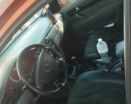 Помаранчевий Шевроле Лачетті, об'ємом двигуна 1.8 л та пробігом 207 тис. км за 4400 $, фото 4 на Automoto.ua