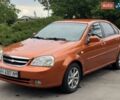 Оранжевый Шевроле Лачетти, объемом двигателя 1.8 л и пробегом 160 тыс. км за 3999 $, фото 1 на Automoto.ua