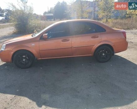 Помаранчевий Шевроле Лачетті, об'ємом двигуна 1.8 л та пробігом 207 тис. км за 4400 $, фото 6 на Automoto.ua
