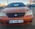 Помаранчевий Шевроле Лачетті, об'ємом двигуна 1.8 л та пробігом 158 тис. км за 4299 $, фото 1 на Automoto.ua