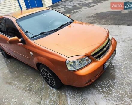 Помаранчевий Шевроле Лачетті, об'ємом двигуна 1.8 л та пробігом 218 тис. км за 5700 $, фото 6 на Automoto.ua