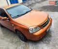 Помаранчевий Шевроле Лачетті, об'ємом двигуна 1.8 л та пробігом 218 тис. км за 5700 $, фото 6 на Automoto.ua
