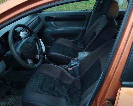 Оранжевый Шевроле Лачетти, объемом двигателя 1.6 л и пробегом 335 тыс. км за 4300 $, фото 18 на Automoto.ua