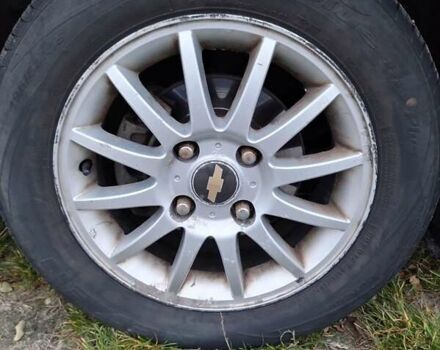 Оранжевый Шевроле Лачетти, объемом двигателя 1.6 л и пробегом 335 тыс. км за 4300 $, фото 15 на Automoto.ua