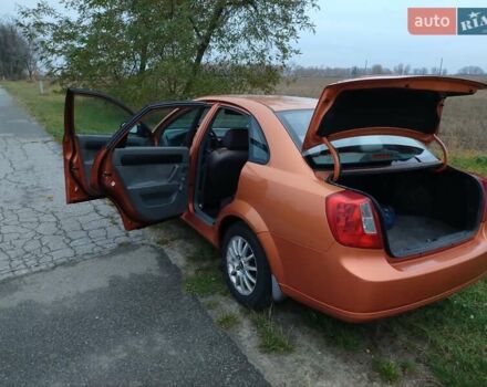 Оранжевый Шевроле Лачетти, объемом двигателя 1.6 л и пробегом 335 тыс. км за 4300 $, фото 11 на Automoto.ua